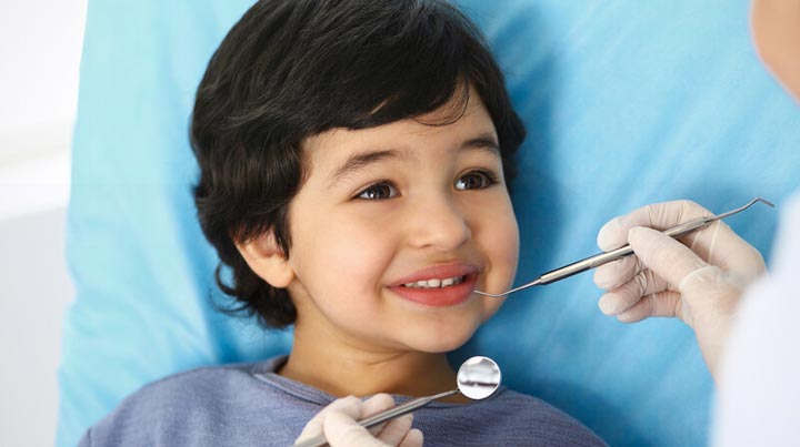 Child with Cavity at Dentist