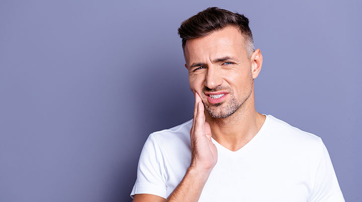 middle aged man lost tooth